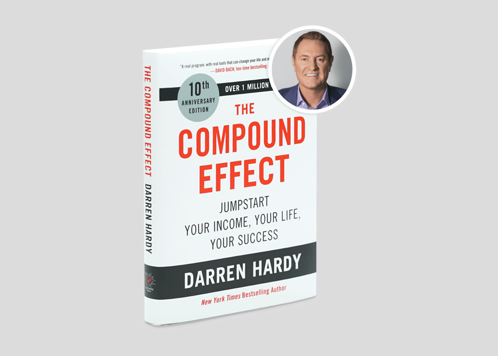 The Compound Effect book written by Darren Hardy on a plain grey background